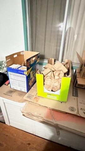 Meal prep boxes and packaged food items collected for cancer survivors