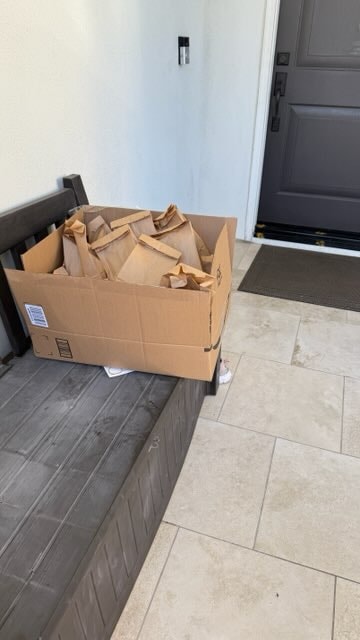 Donation bags at the doorway ready for pickup